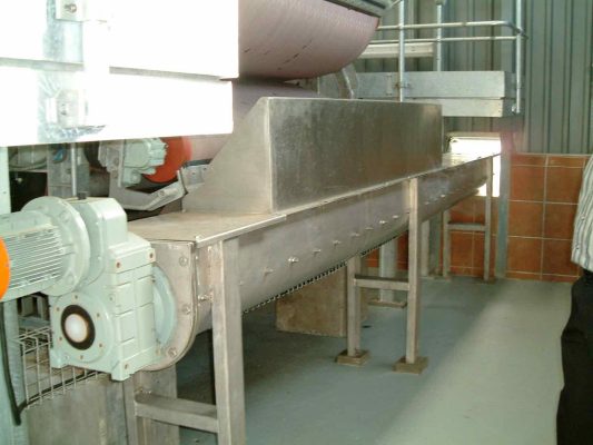 Screw conveyor. Screw conveyor is a mechanism that uses a rotating helical screw blade (screw flights) to move granular or semi-solid materials. Screw Conveyor for material handling in wastewater treatment plant.